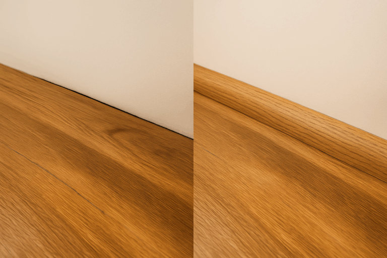 Close-up of laminate flooring finished with quarter round trim next to unfinished edge showing visible gap