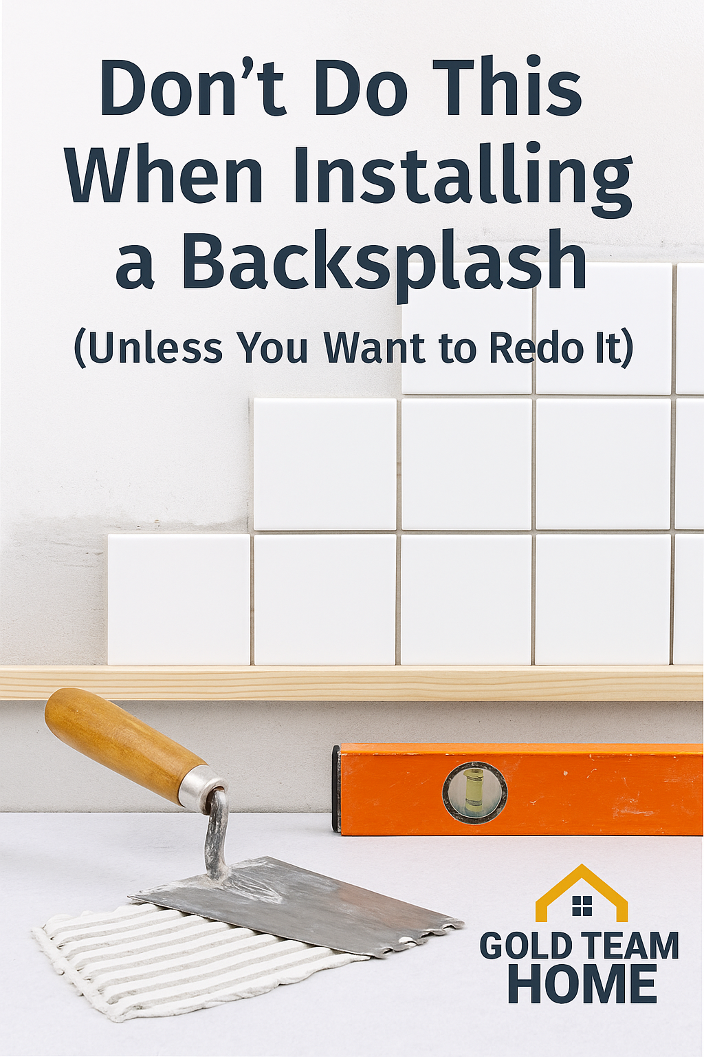 Featured image showing a clean, modern kitchen backsplash installation in progress with white subway tiles and a notched trowel applying adhesive, overlaid with the title 'Don’t Do This When Installing a Backsplash (Unless You Want to Redo It)' and the Gold Team Home logo in the bottom right corner.